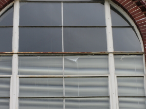 Example of early stages of corrosion on historic steel windows.