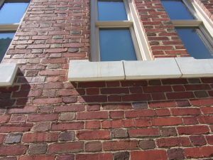 Example of proper repointing that matches historic mortar composition,  